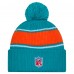 Шапка с помпоном Miami Dolphins New Era Aqua 2024 Sideline Cuffed Knit