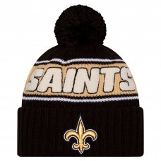 Шапка с помпоном New Orleans Saints New Era Black 2024 Sideline Cuffed Knit