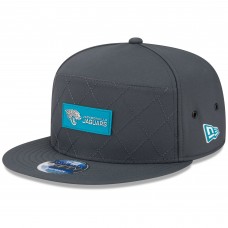 Бейсболка Jacksonville Jaguars New Era Charcoal 2025 Sideline Cold Weather Split Panel 9FIFTY Snapback