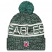 Шапка с помпоном Philadelphia Eagles New Era Midnight Green 2025 Sideline Cold Weather