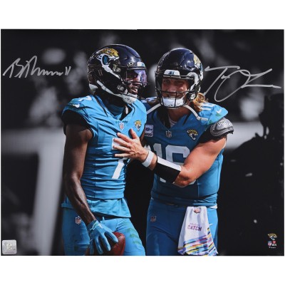 Trevor Lawrence & Brian Thomas Jr. Jacksonville Jaguars Autographed Fanatics Authentic 16 x 20 Teal Jersey Spotlight Photograph