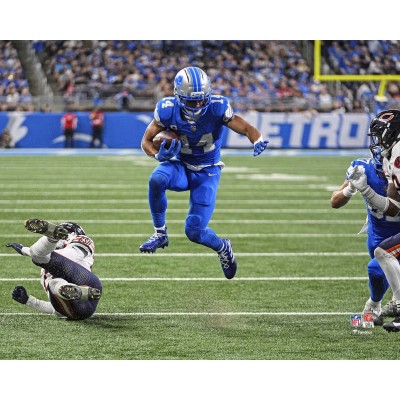 Amon-Ra St. Brown Detroit Lions Unsigned Fanatics Authentic 2025 Week 2 Hurdle Touchdown Photograph