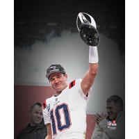 Drake Maye New England Patriots Unsigned Fanatics Authentic Holding 2025 AFC Championship Trophy Spotlight Photograph