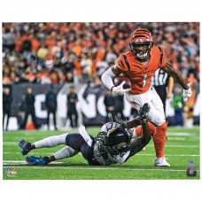Autographed Cincinnati Bengals JaMarr Chase Fanatics Authentic 16 x 20 Orange Breaking Tackle Photograph