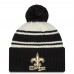 Шапка с помпоном New Orleans Saints New Era Cream/Black 2022 Sideline Sport Cuffed Knit