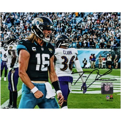 Trevor Lawrence Jacksonville Jaguars Autographed Fanatics Authentic 8 x 10 In the Rain Photograph